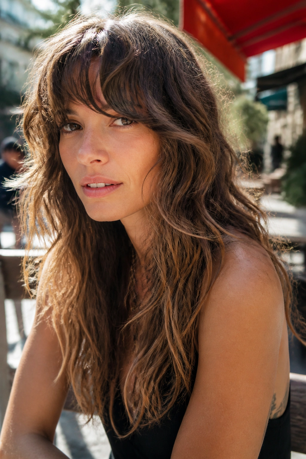 Close-up of real person with air-dry shag and natural waves outdoors