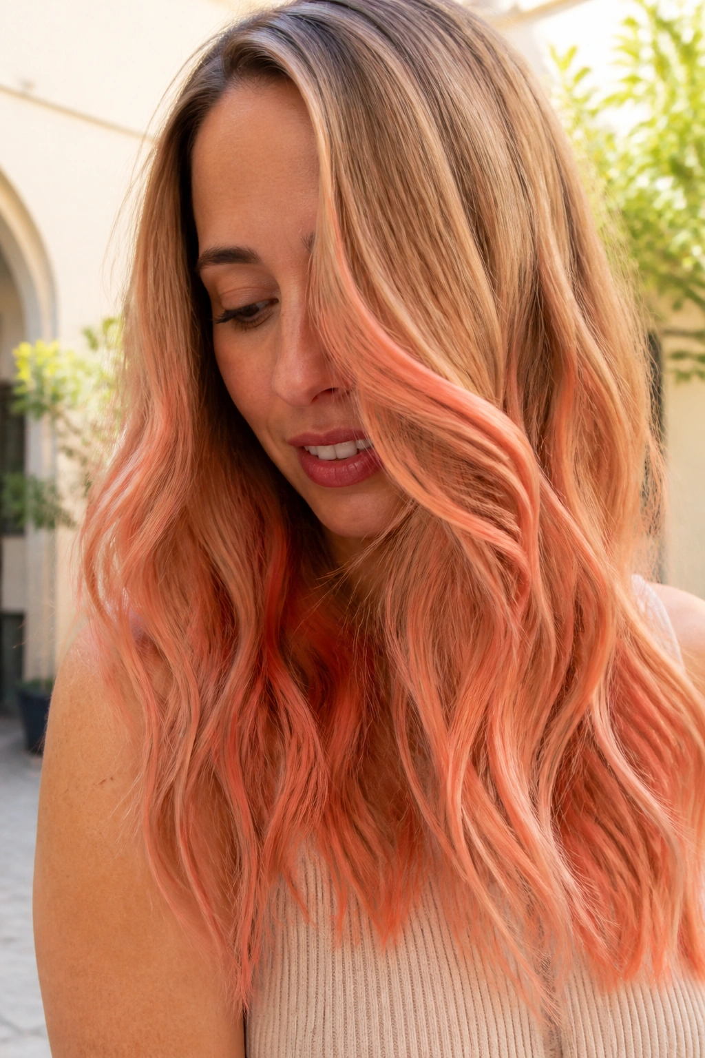 Close-up of a real woman with apricot peach mid-length blend