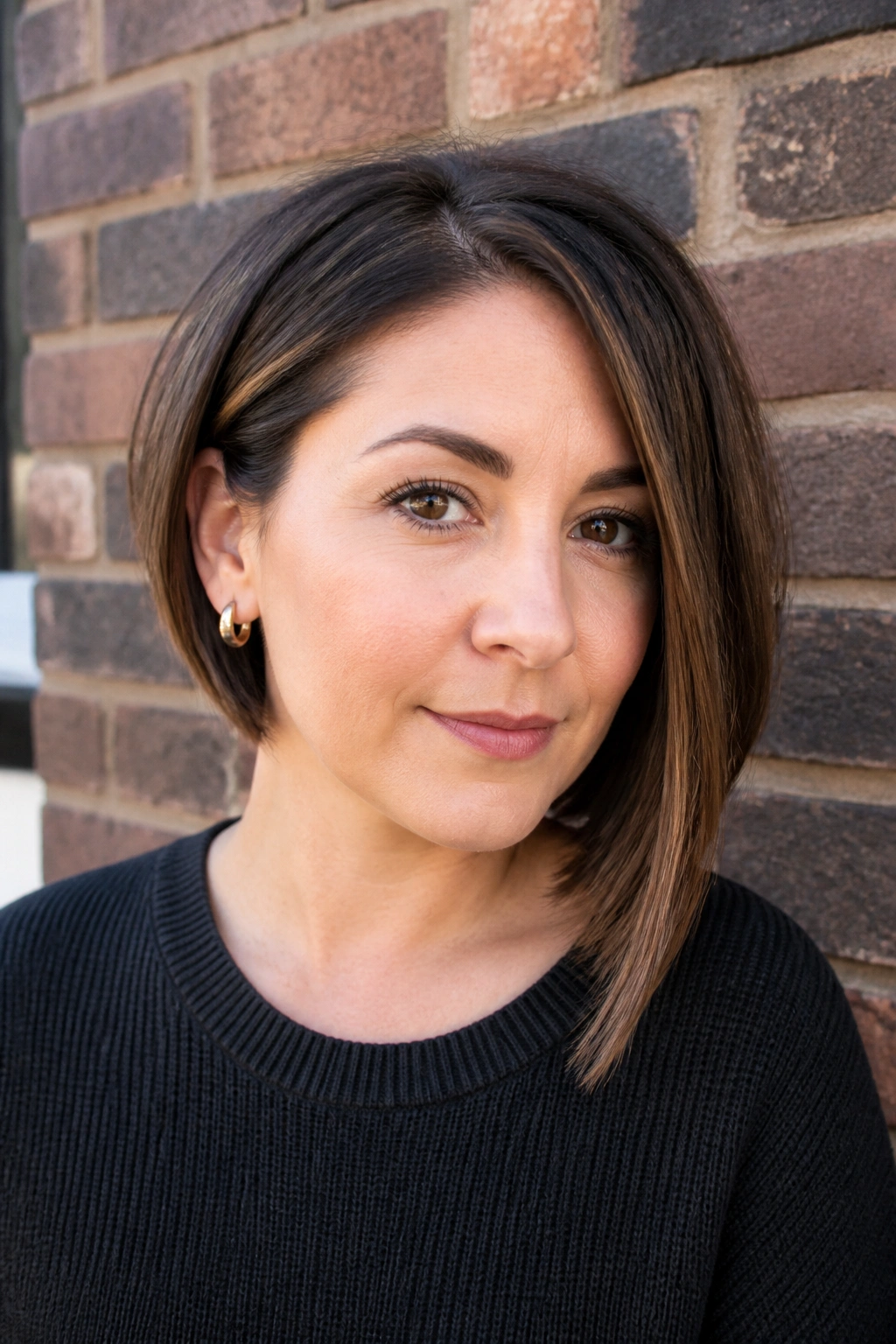 Close-up portrait of a woman with an asymmetrical bob