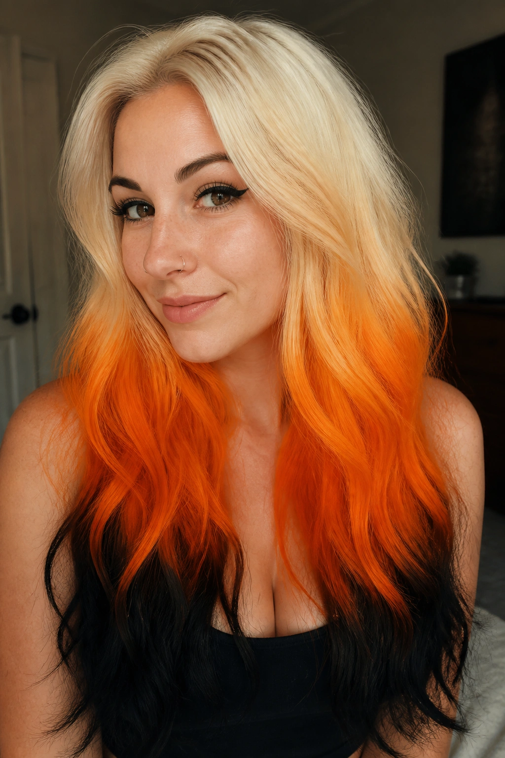 Close-up of a real person with blonde orange black candy corn hair gradient