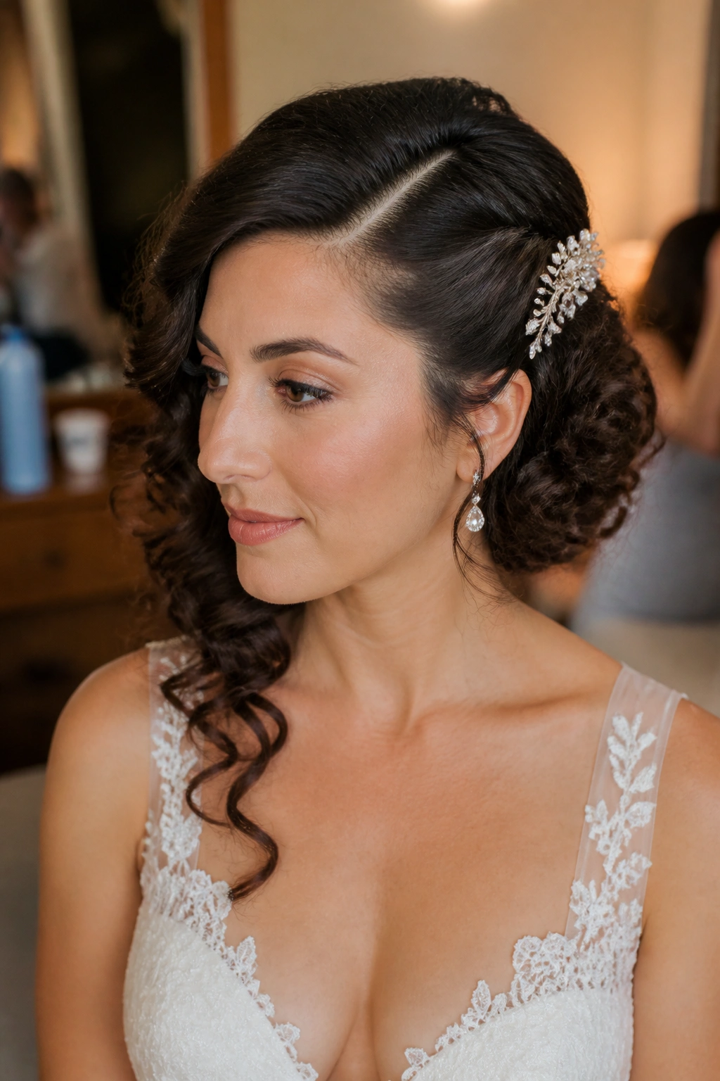Close-up of a real bride with a deep-part side-swept curly updo