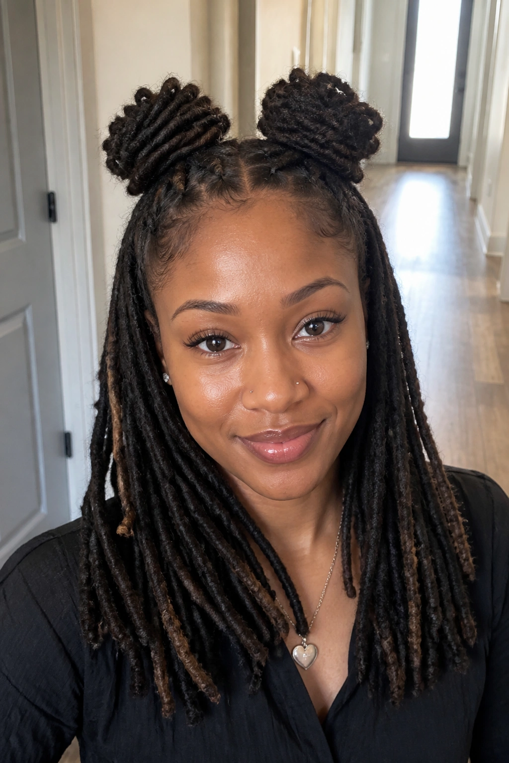 Close-up of a real woman with double puff half-up hairstyle