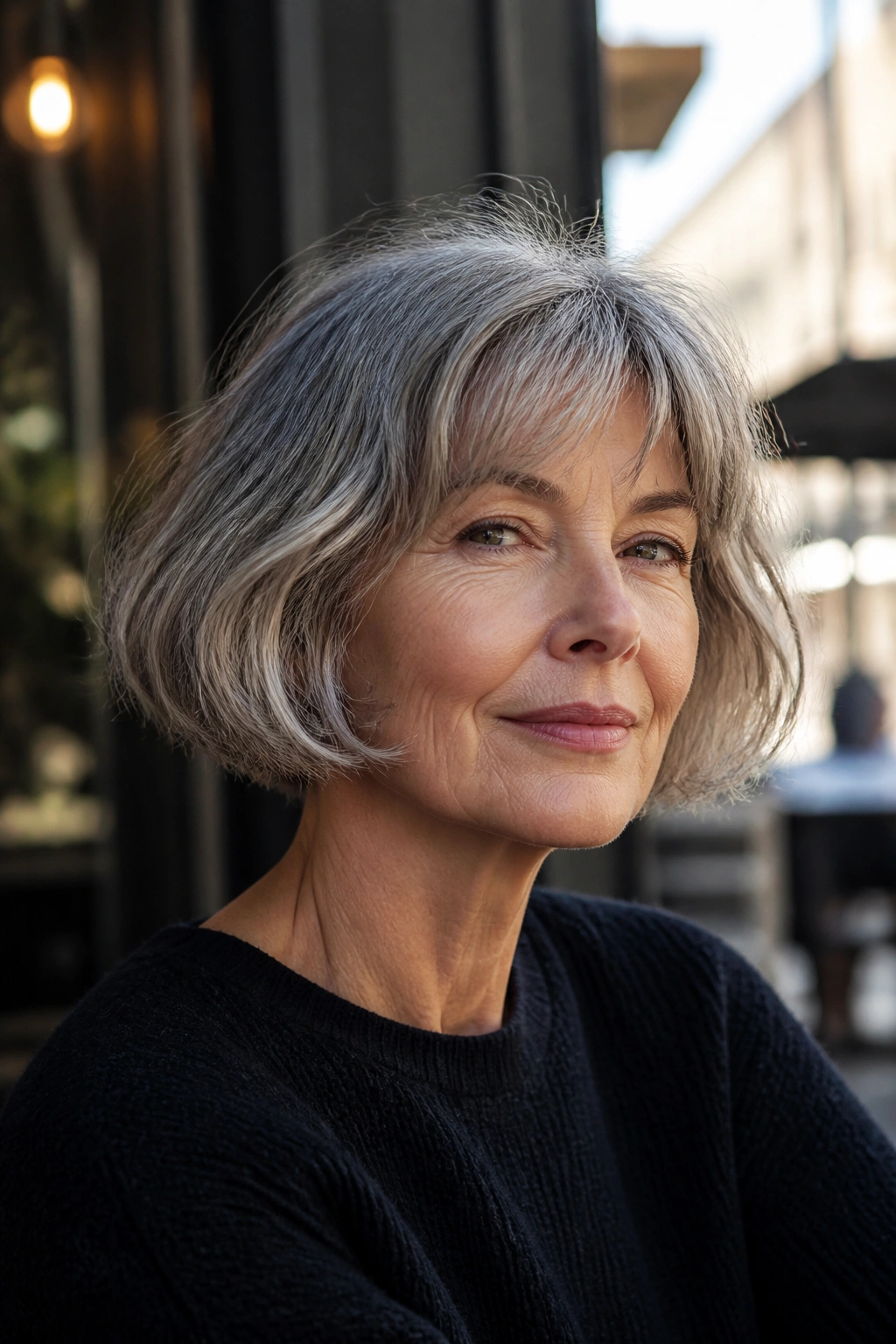 Close-up of a real woman with a jaw-length French bob