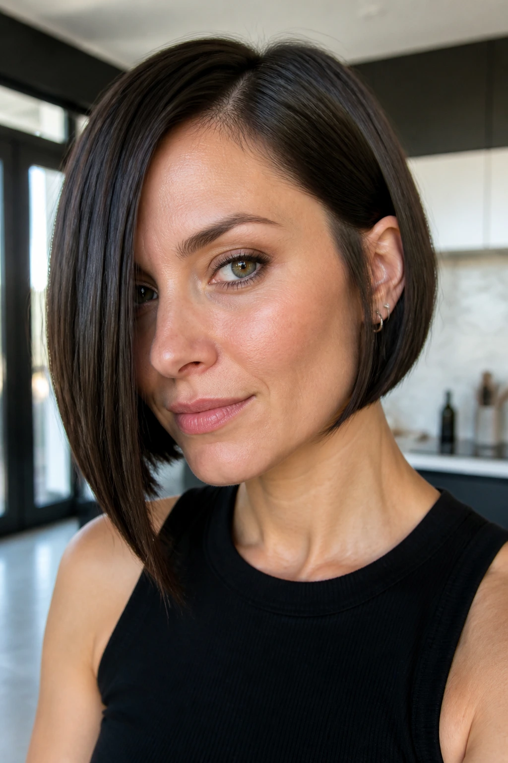 Real woman with glassy straight asymmetric bob close-up