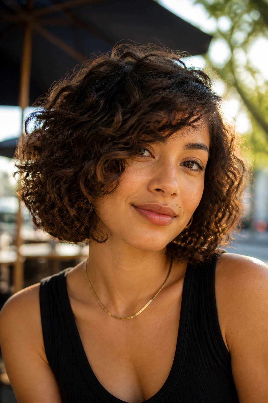 Close-up of a real woman with jaw-length bob and side-swept bangs.