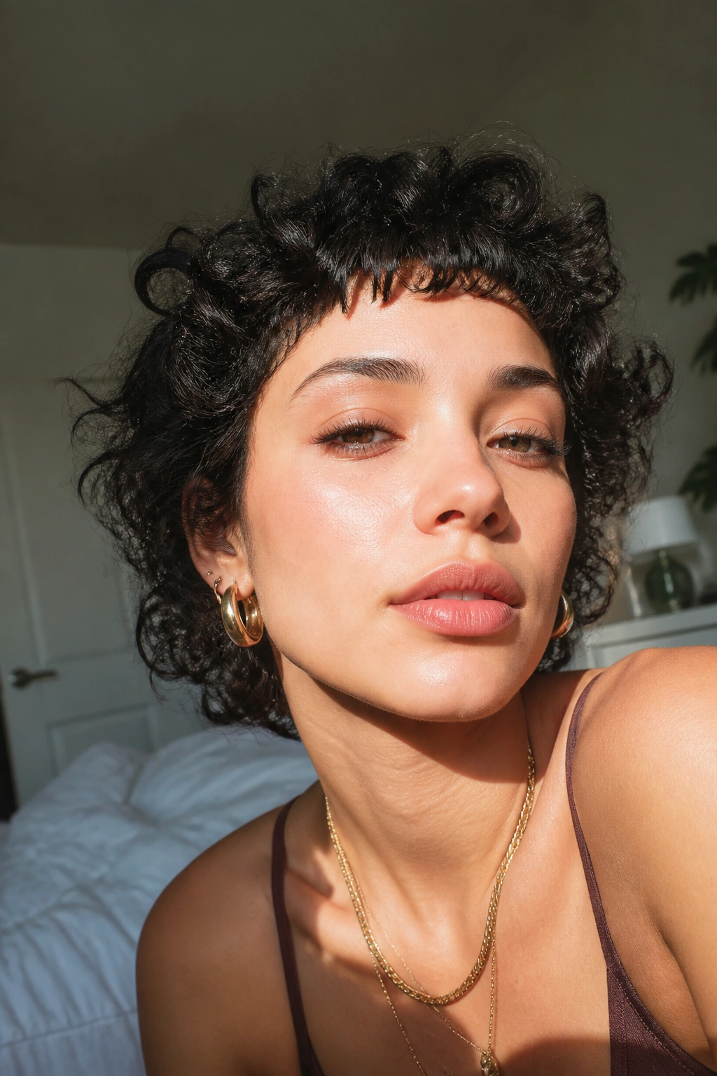 Close-up portrait of a real person with micro bangs sitting high on the forehead