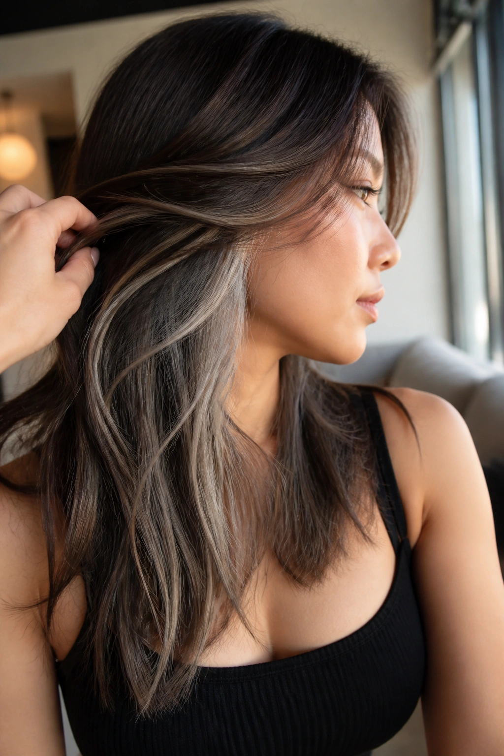 Side view showing hidden silver peekaboo layers beneath a brown top layer.