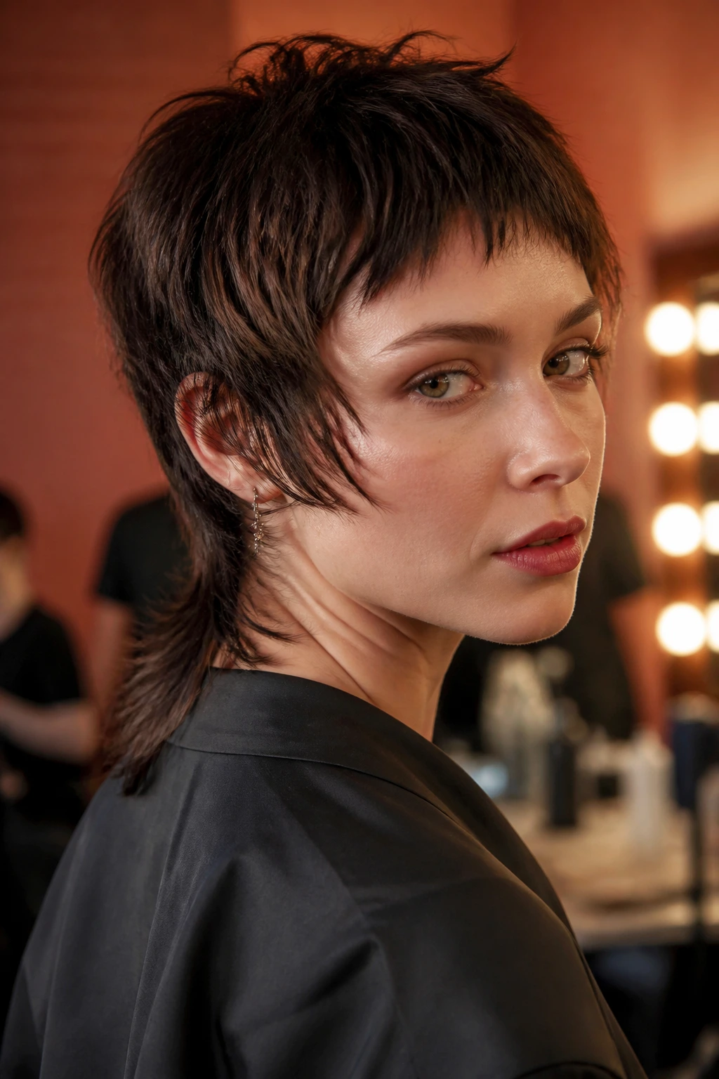 Real person with cropped front micro mullet and soft back tail