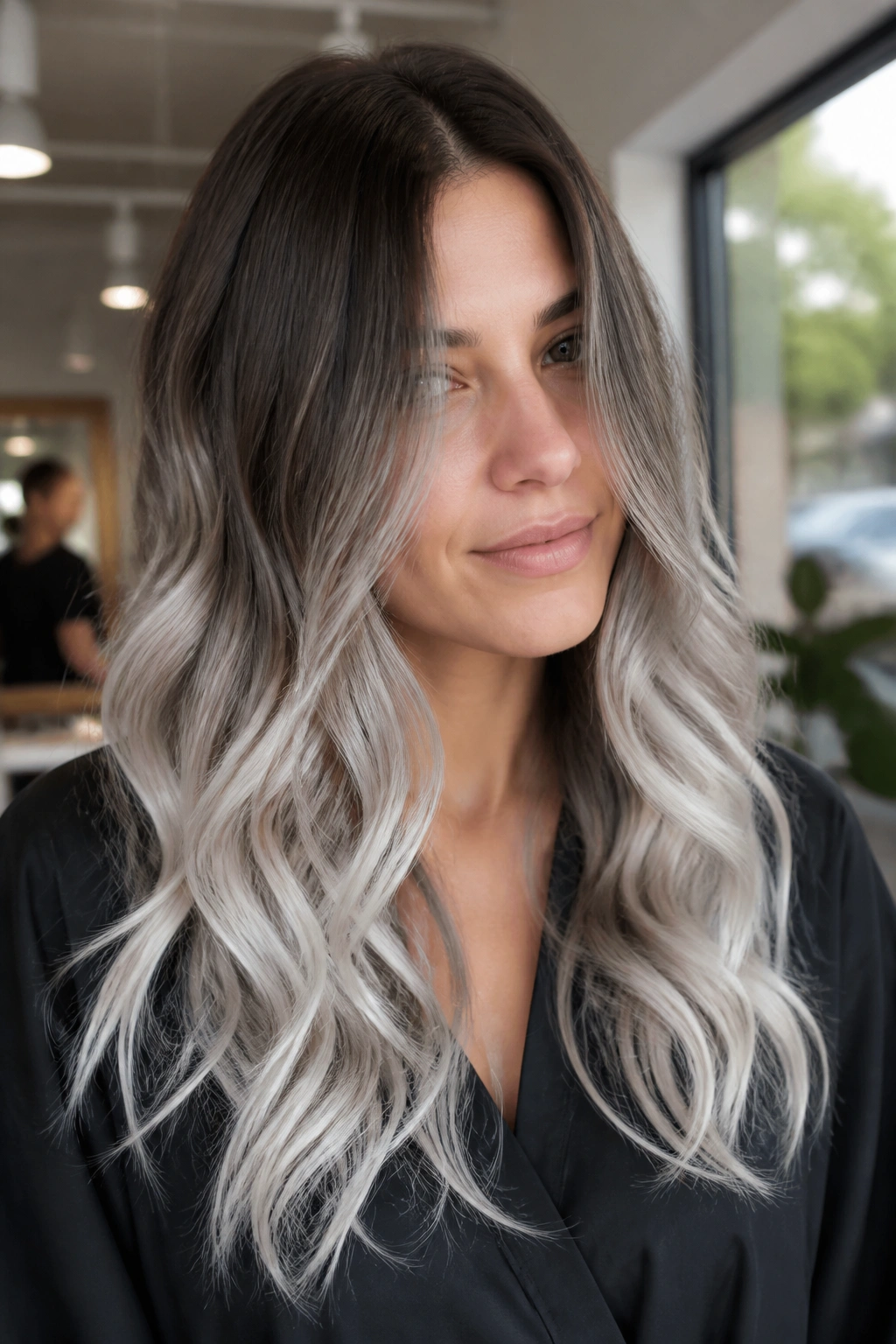 Long hair gradient from brown to platinum-silver ombré from mid-lengths down