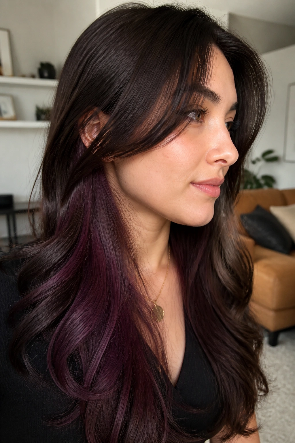 Close-up of brunette with hidden plum panels under top layers