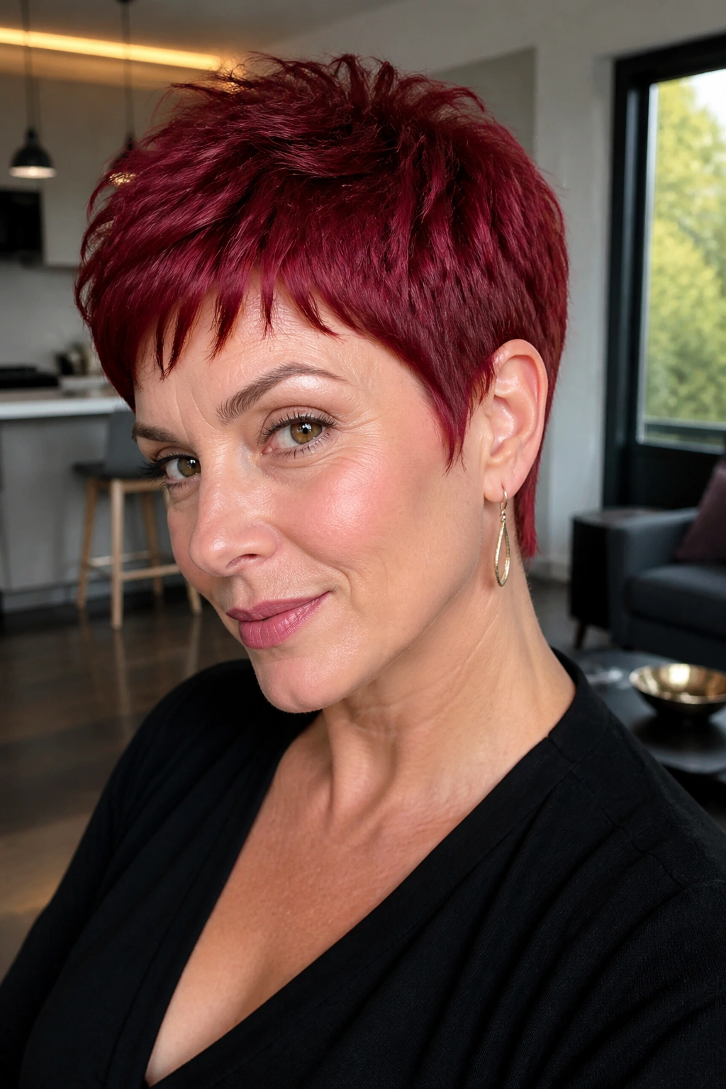 Close-up of a real woman with a ruby red pixie haircut