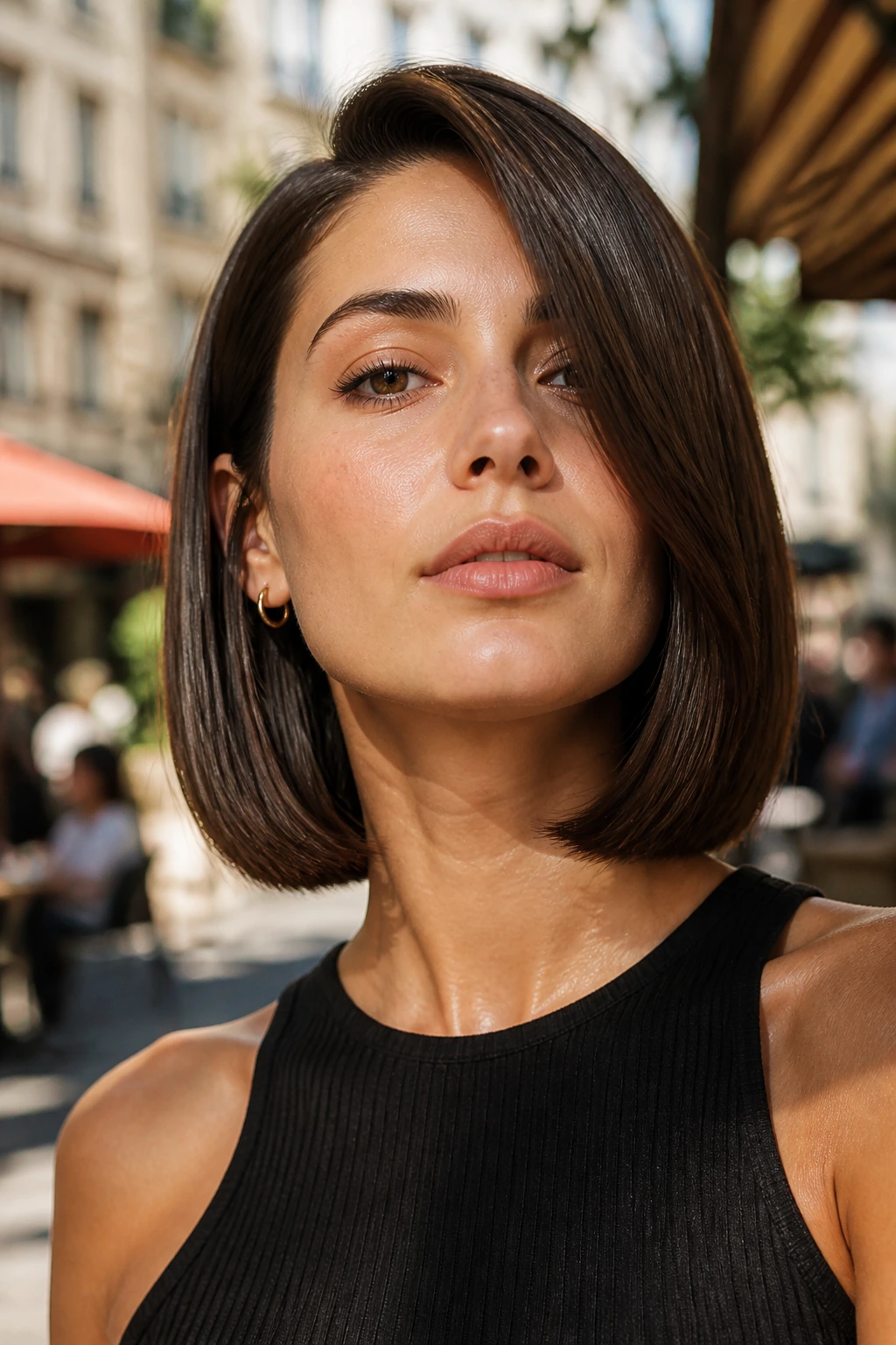 Close-up of a real woman with a deep side-part smooth bob