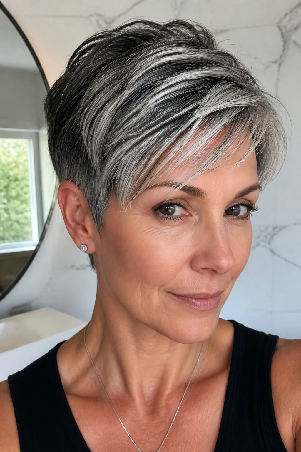 Close-up of salt-and-pepper hair with silver streaks on a real person