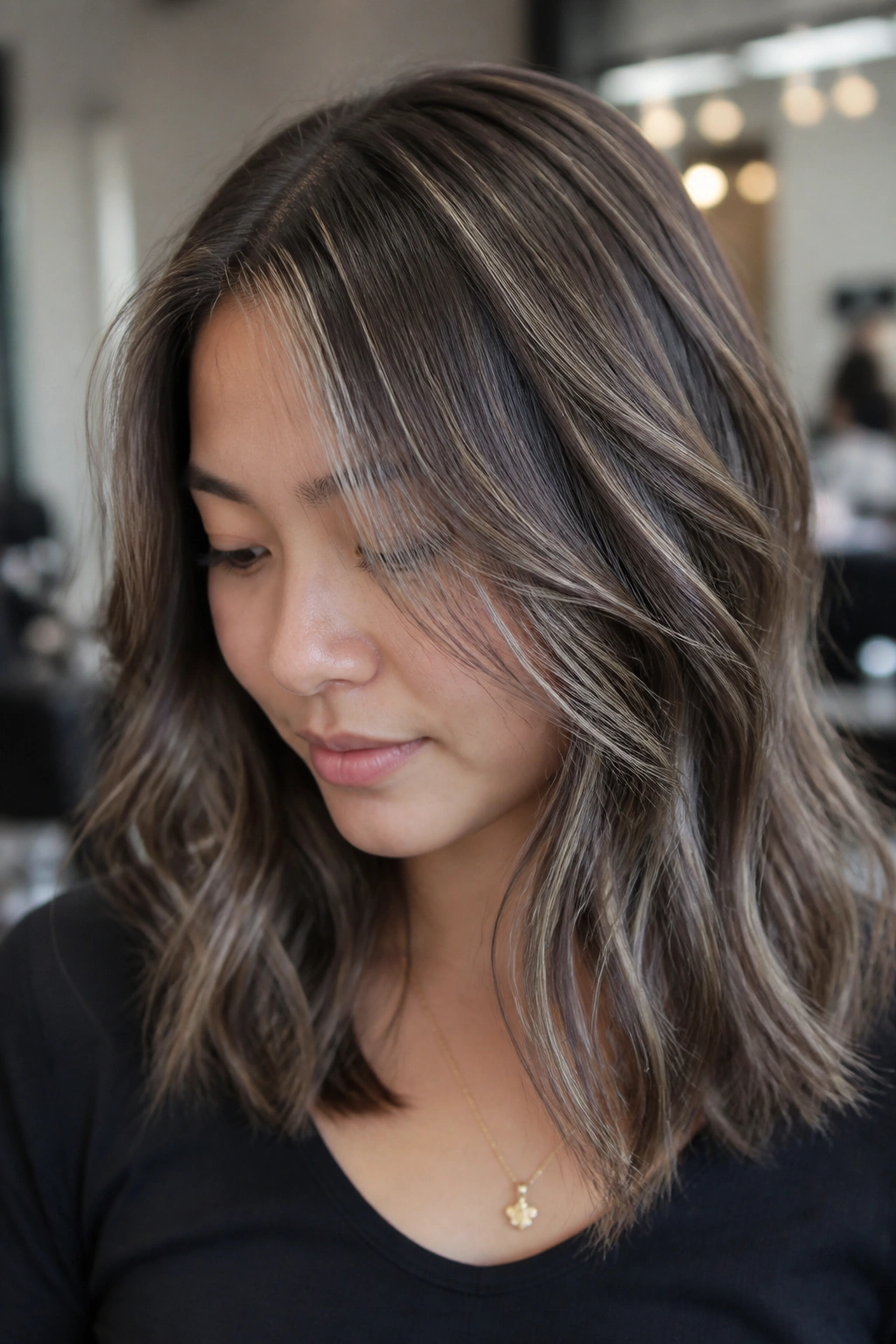 Medium brown hair with metallic silver and taupe dimension