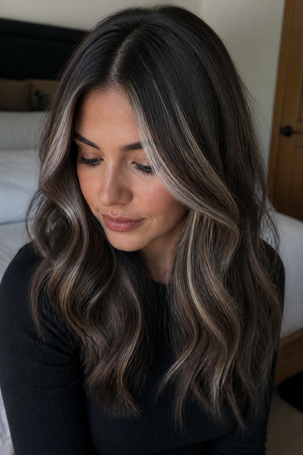 Close-up of a real person with mushroom brunette hair and icy taupe ribbons