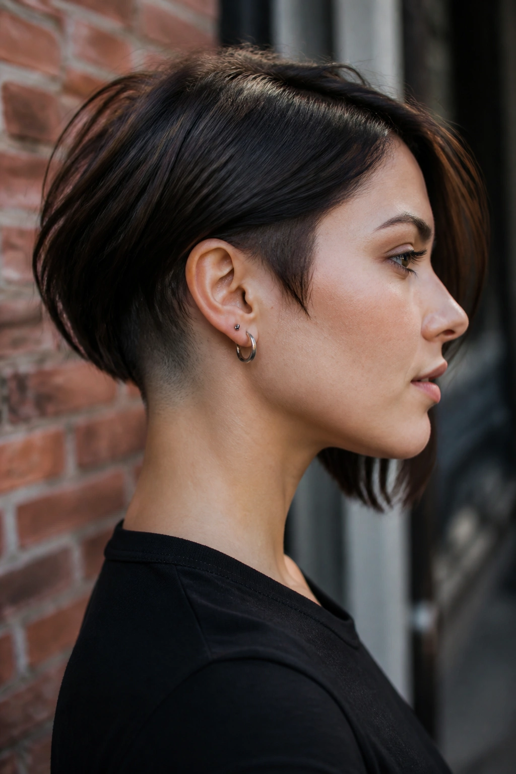 Close-up portrait of a real person with an undercut bob hairstyle