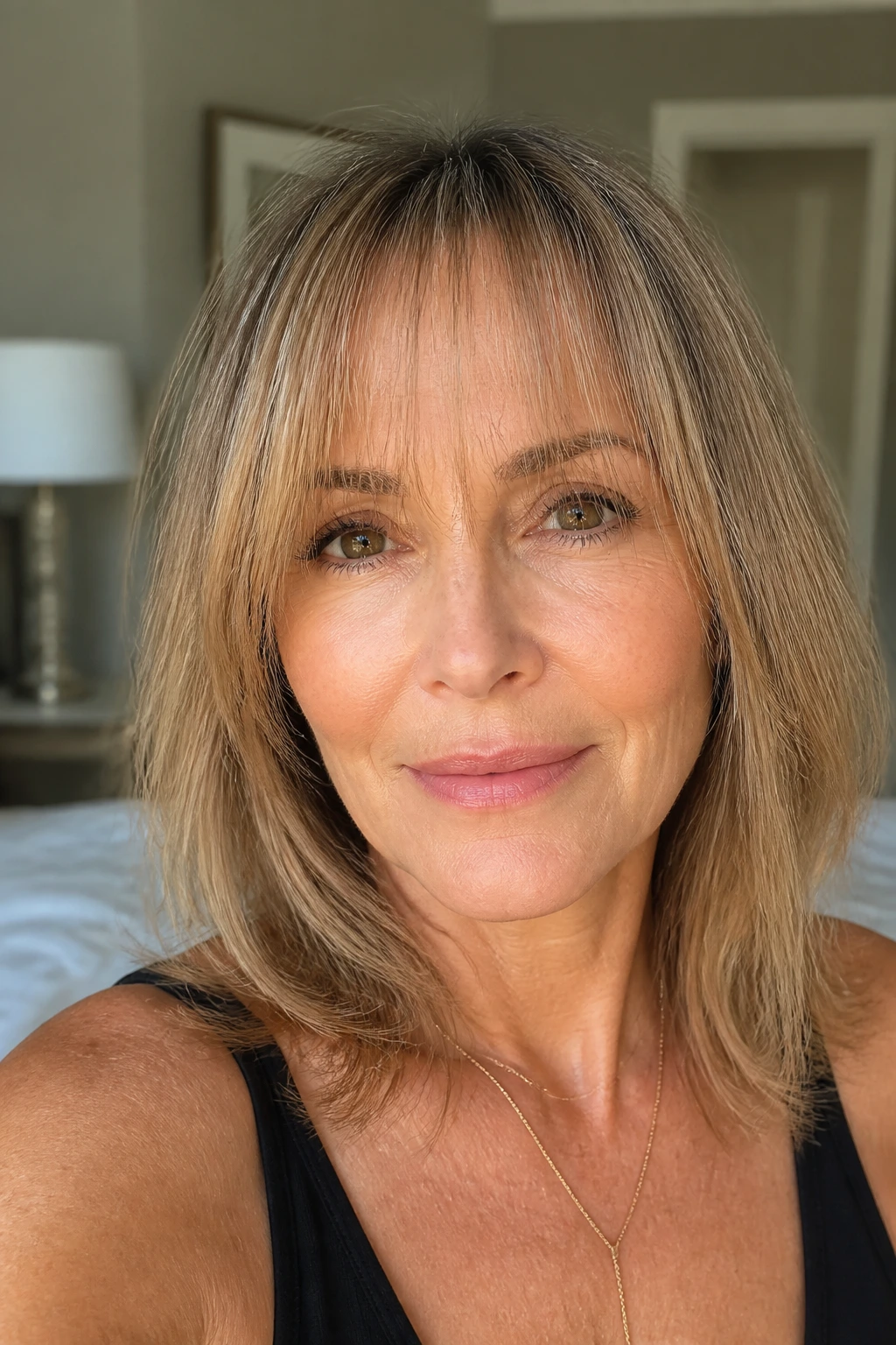 Close-up of a real woman wearing veil bangs softly over the forehead