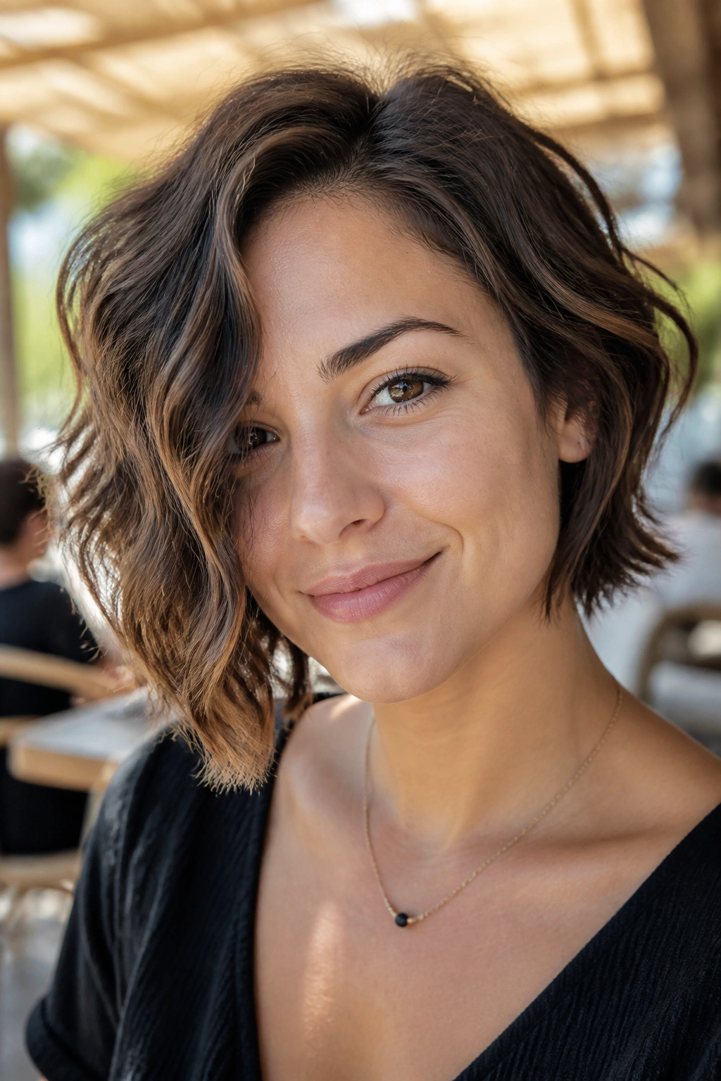 Portrait of woman with wavy bob and bent ends