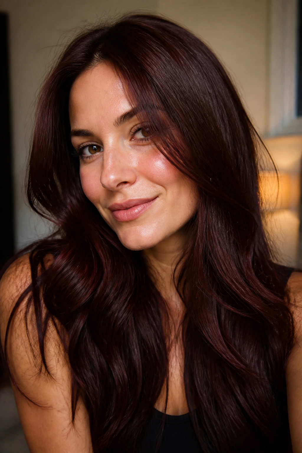 Brunette hair with chocolate cherry burgundy tint close-up