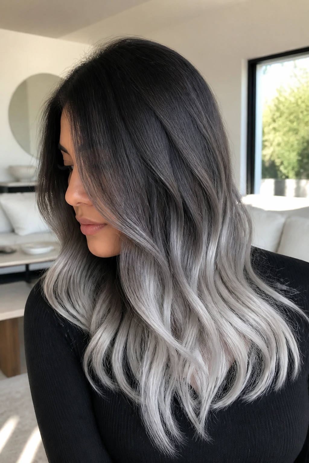 Side-profile of real person with frosted silver ends and dark roots